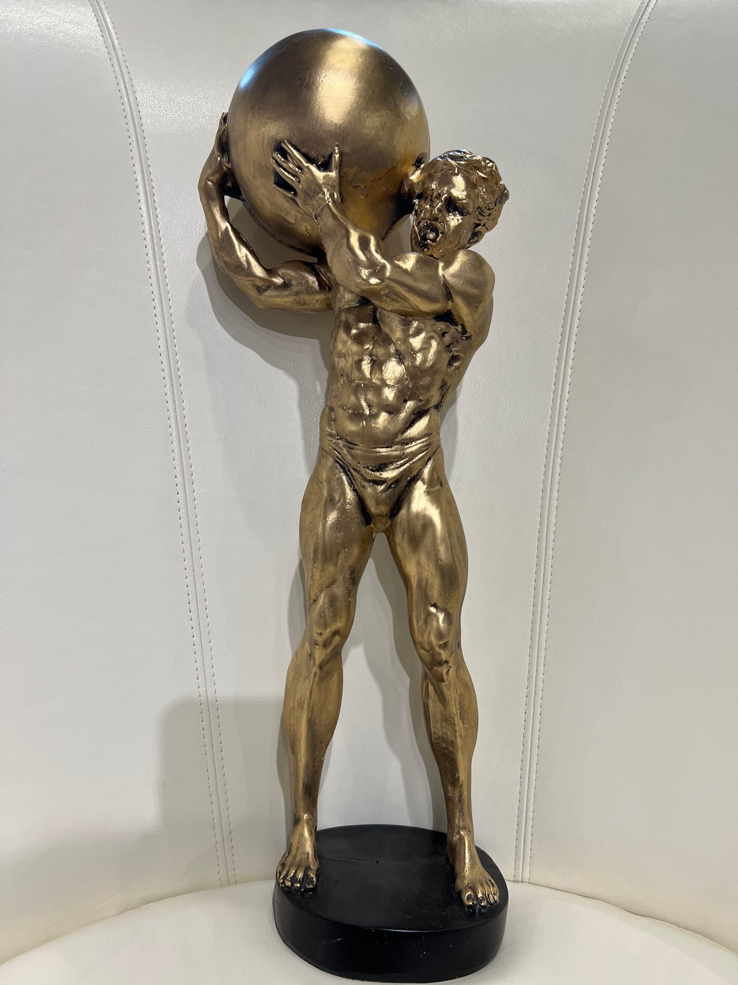 Strong Man Lifting - Furniture King